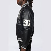 Smoke Rise Studded Patched Varsity Jacket - Black