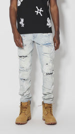 Rip And Repair Fashion Jeans